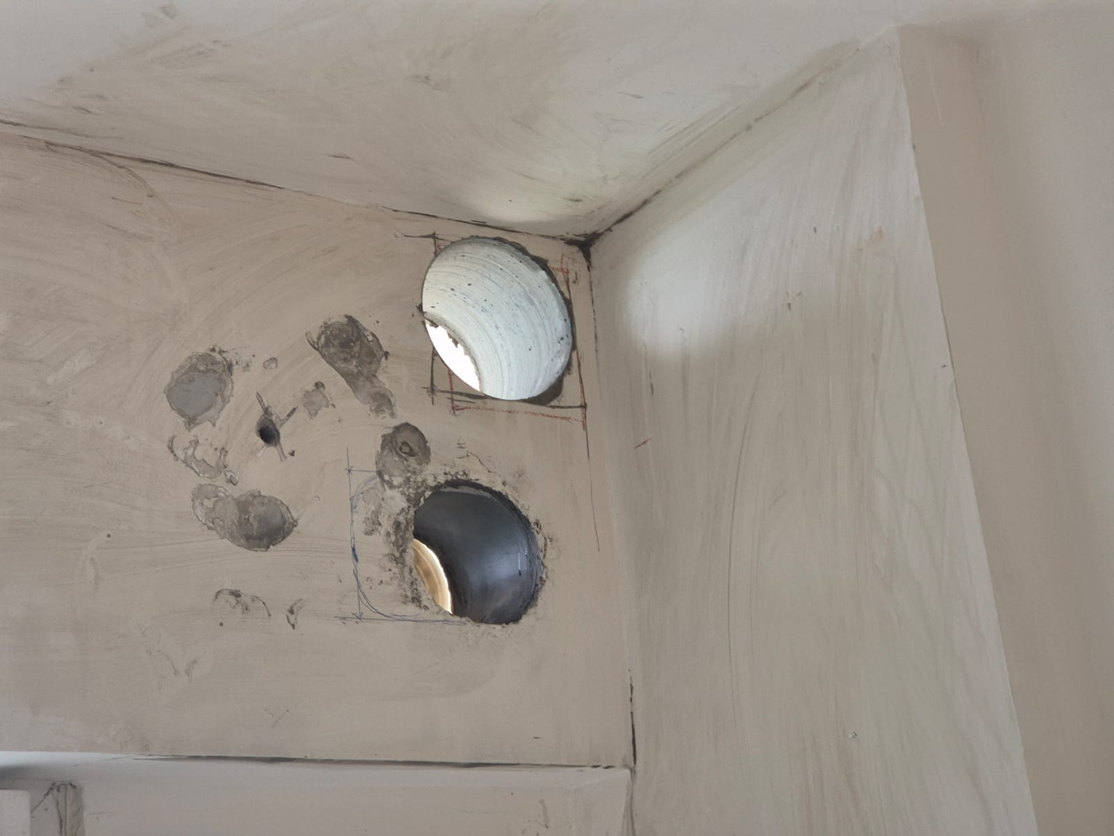 Twin duct holes, finished ceiling